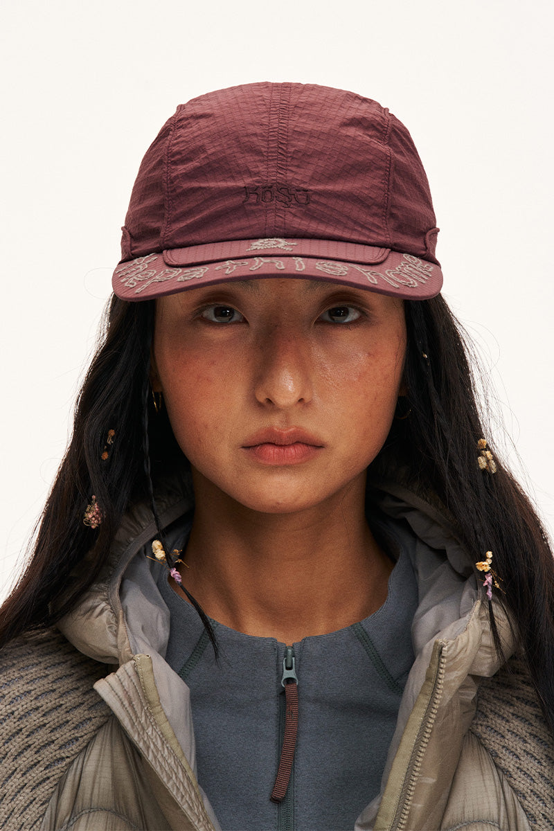 Water-repellent embroidered mesh cap